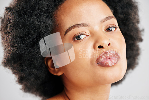 Image of Skin care, beauty and portrait of a black woman with dermatology, cosmetics or natural makeup. Closeup and face of serious African female model in studio for facial glow, self love and afro hair