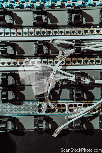 Image of Close up of technician setting up network in server room