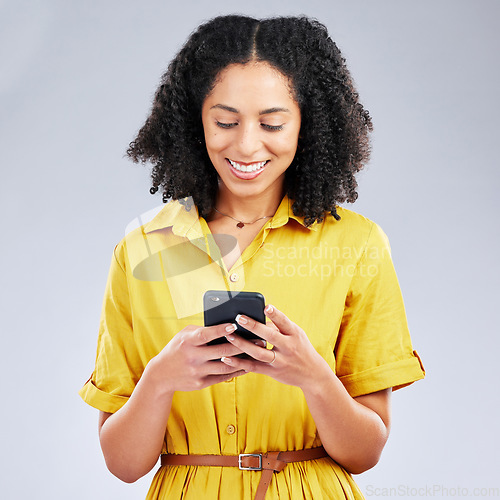 Image of Phone, chat or happy woman in studio on social media, mobile app or internet scrolling online. Networking, research or female person typing on digital technology web on white background with smile