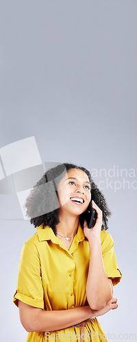 Image of Happy woman, phone call and thinking on mockup space for communication against a white studio background. Female person smile in wonder for talking, conversation or discussion on mobile smartphone