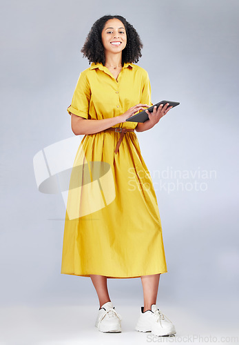 Image of Tablet, happy portrait and studio woman, designer or person with online connection, news article or internet research. Communication, social media or networking person search info on white background