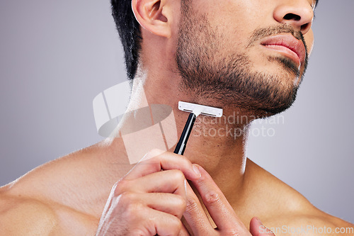 Image of Beard hair, razor and closeup man with beauty routine, self care treatment, morning bathroom grooming and cosmetics skincare. Neck cleaning, salon wellness or studio person shaving on grey background