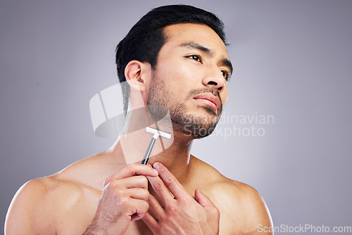 Image of Beard hair, razor and face of man with bathroom routine, self care treatment, relax facial grooming or cosmetics skincare. Neck cleaning, hygiene wellness and studio person shaving on grey background