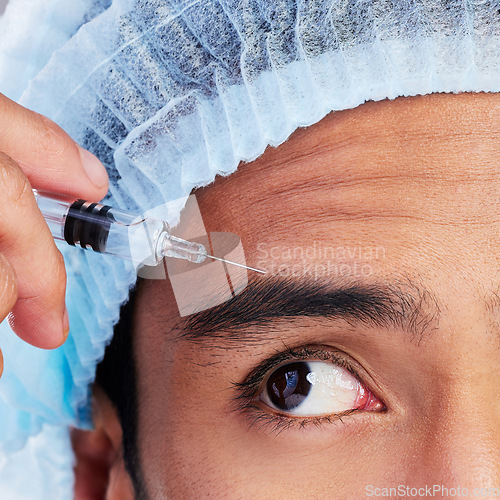 Image of Eye, hand and plastic surgery with a man in studio on a gray background for silicon injection. Face, beauty and transformation with a male client in a clinic for antiaging filler or cosmetic facelift