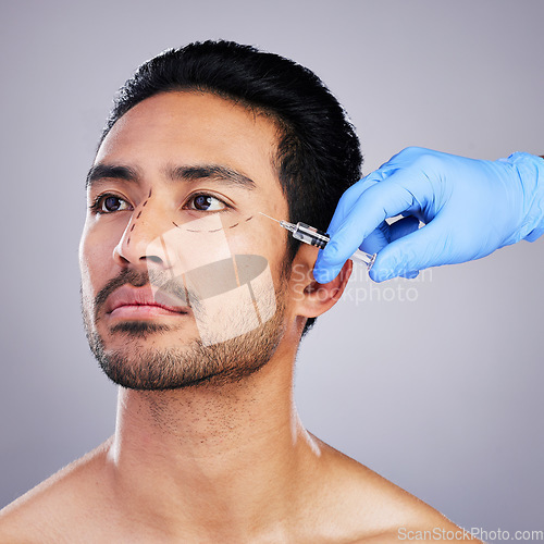 Image of Beauty, plastic surgery and injection with face of man in studio for prp, aesthetics and collagen. Spa, skincare and dermatology with person on gray background for facial, cosmetics and filler