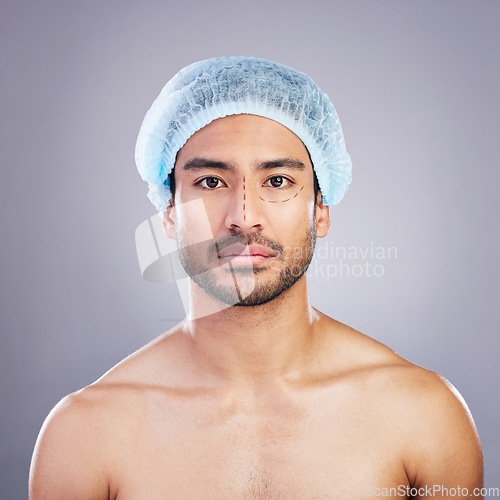 Image of Portrait, skincare and man with plastic surgery, change and beauty enhancement against a grey studio background. Face, male person and model with transformation, facial dermatology and aesthetic