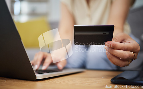 Image of Hands, credit card and online shopping on laptop in home for digital payment, fintech password and ecommerce. Closeup of person, computer and internet banking for financial sales, budget and account