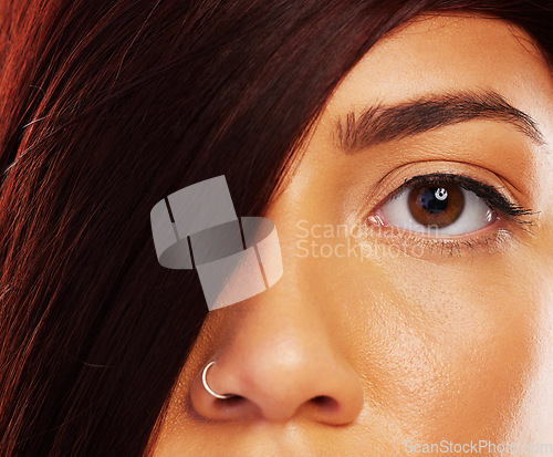 Image of Portrait, hair and eye with a model woman closeup for skincare, beauty or makeup for luxury aesthetic. Face, wellness and a young female person in the salon for keratin haircare or cosmetic treatment