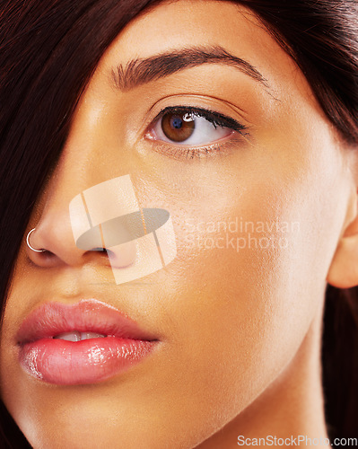 Image of Face, hair and eye with a model woman closeup for skincare, beauty or makeup for luxury aesthetic. Spa, wellness and a young female person in the salon for keratin haircare or cosmetic treatment