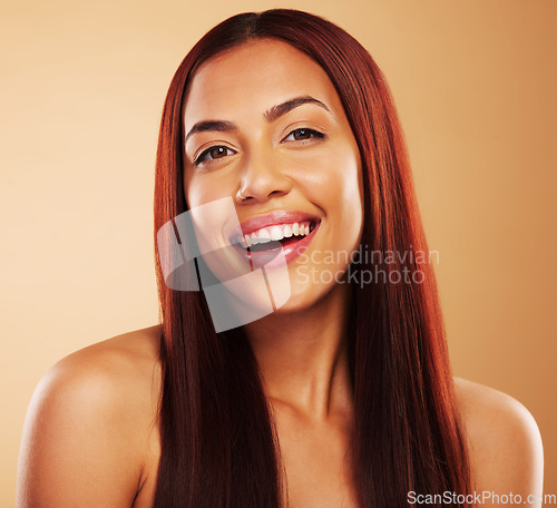 Image of Hair care, beauty and portrait of happy woman with glow, luxury salon treatment and brown background. Natural smile, haircut and haircare, face of model with cosmetics and keratin shine in studio.