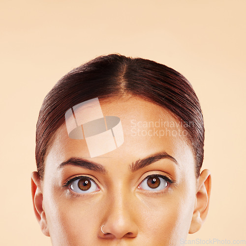 Image of Face, skincare mockup or eyes of woman in studio isolated on beige background for beauty aesthetic. Facial glow routine, portrait or natural girl model with eyebrows, self love or spa microblading