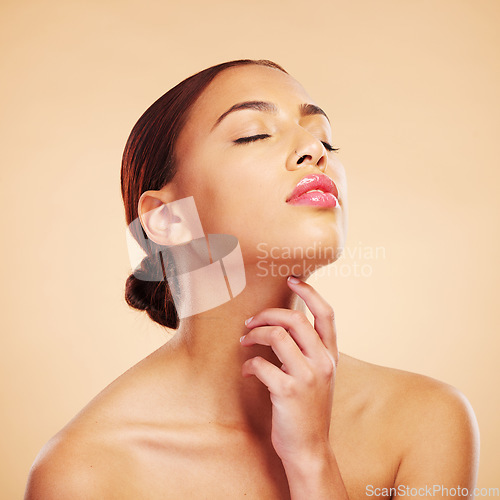 Image of Face, relax or woman with natural beauty in studio isolated on brown background for wellness or glow. Facial treatment, hand or Brazilian girl model touch neck in self love, eyes closed or cosmetics