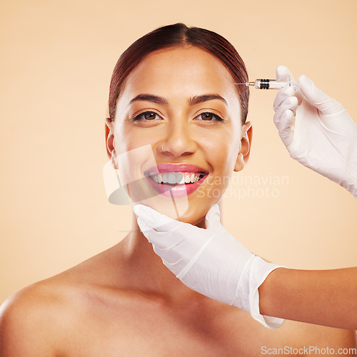 Image of Portrait, happy woman or plastic surgery with a needle, cosmetics isolated on studio background. Hands, forehead or face of model with injection, smile or beauty in dermatology medical procedure