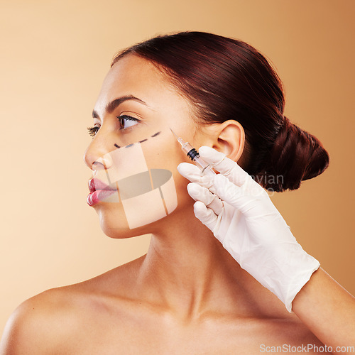 Image of Injection, plastic surgery and face of woman with beauty treatment for isolated in brown studio background. Skincare, cosmetics and young person with syringe for facial or medical transformation