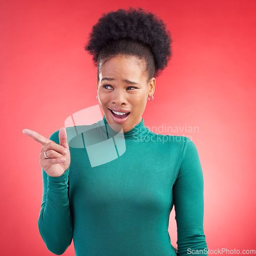 Image of Pointing, confused and a black woman on a red background for showing, angry or frustrated. Thinking, fail and an African girl with a hand gesture on a backdrop for crazy reaction, mistake or goofy