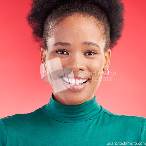 Image of Happy, portrait and face of a black woman in studio with a smile, confidence and positive mindset. Beauty, natural makeup and African female person with cosmetics on a red background for skin glow