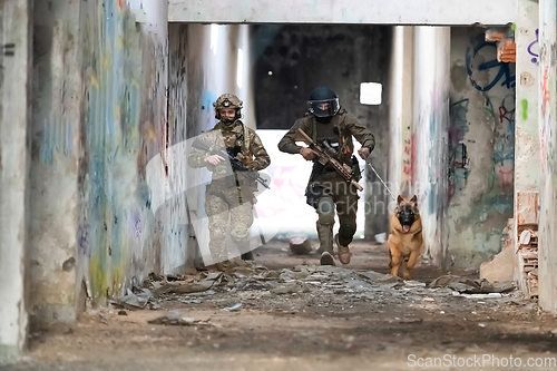 Image of Modern Warfare Soldiers with military working dog in action on the battlefield.