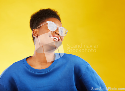 Image of Smile, fashion and glasses with face of black woman in studio for vision, eye care and color style. Gen z, smile and happiness with creative female person on yellow background for health on mockup