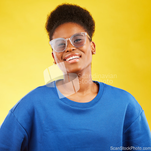 Image of Woman, smile and studio portrait with glasses and happy with eye care and yellow background. Face, African female person and model with eyewear, frame and fashion with style and confidence of girl