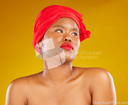 Image of Beauty, makeup and cosmetics with face of black woman in studio for red head scarf, creative and pride. Skincare, salon and spa with female model on brown background for wellness, self care and glow