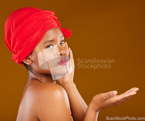 Image of Beauty, makeup and show with face of black woman in studio for mockup, creative and cosmetics. Skincare, salon and presentation with female model on brown background for wellness, self care and glow