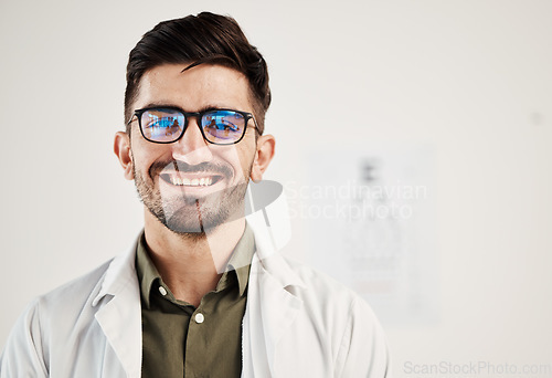 Image of Eye exam, smile and portrait of man optometrist with confidence, glasses and friendly service in consultation office. Ophthalmology, face and happy male eye expert proud of vision testing career