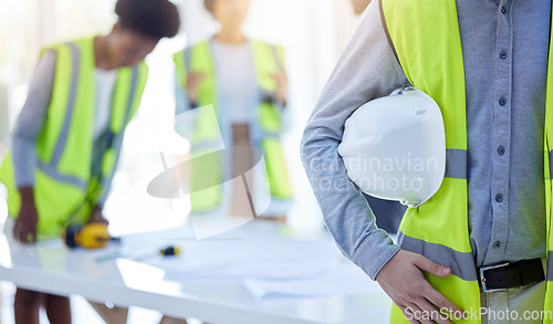 Image of Construction worker, closeup and helmet with arm of engineer, builder or contractor. Industrial team, handyman gear and person with protection and safety for engineering and architecture project