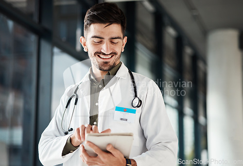 Image of Happy, man and doctor with tablet in hospital for Telehealth, advice and social chat or research. Healthcare, news and male health expert smile for online, website or internet communication at clinic