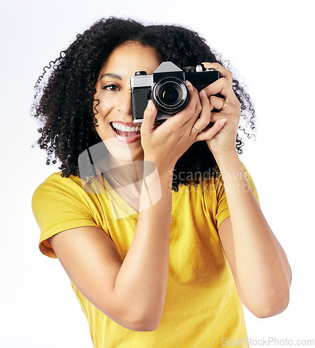 Image of Photography, camera and happy woman photographer and smile as a creative isolated in a studio white background. Portrait, photoshoot and artistic person with a hobby and takes picture of memory