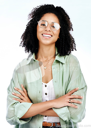 Image of Woman, arms crossed and smile portrait of a creative writer in a studio with confidence and glasses. Isolated, white background and female person feeling proud from blogger career with a happy worker