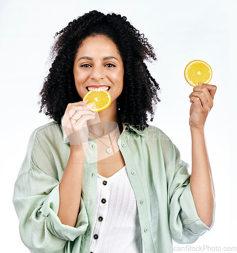 Image of Portrait, orange and woman with a smile, healthy snack and girl isolated against a white studio background. Face, female person or model with fruit, vitamin c and nutrition with happiness or wellness