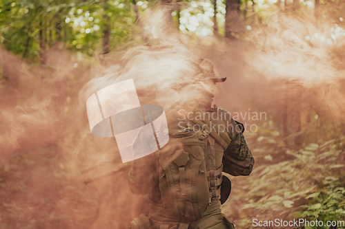 Image of Battle of the military in the war. Military troops in the smoke