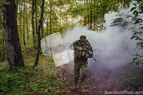 Image of Battle of the military in the war. Military troops in the smoke