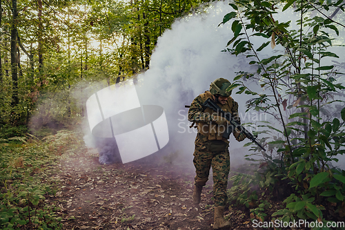 Image of Battle of the military in the war. Military troops in the smoke