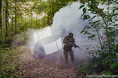 Image of Battle of the military in the war. Military troops in the smoke