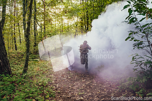 Image of Battle of the military in the war. Military troops in the smoke