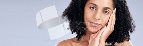 Image of Portrait, beauty and mockup with a model woman in studio on a gray background banner for skincare. Face, aesthetic and space with a young female person at the salon for luxury wellness or treatment