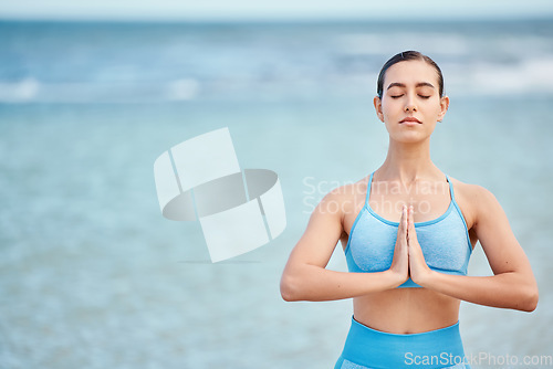 Image of Meditation mockup, yoga and woman by beach with praying hands for wellness and healthy body on space. Fitness, nature and female person with mindfulness for exercise, training and balance by ocean