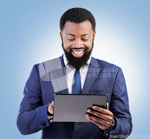 Image of Corporate black man, business and tablet in studio for online planning, stock market research or internet info on blue background. Happy trader, digital technology and network data for app connection