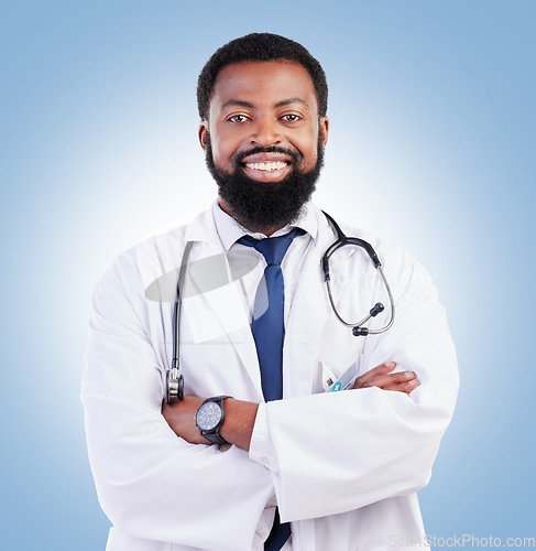 Image of Doctor, black man and portrait with arms crossed in studio or happy medical expert or healthcare worker on blue background. African surgeon, smile and confidence in medicine or research in hospital