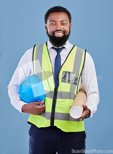 Image of Happy black man, portrait and construction blueprint in studio for safety inspection, maintenance or architecture. Engineering, contractor and industrial manager with building plan on blue background