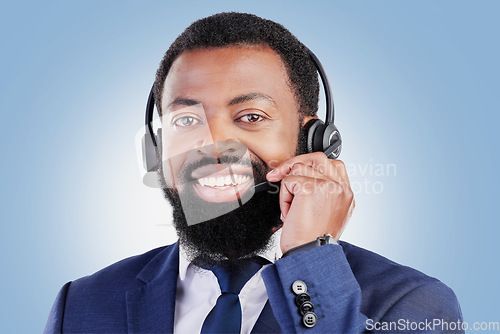 Image of Customer support headset, happy portrait and black man consulting for call center advice, telecom services or sales pitch. E commerce, studio face and African person talking on mic on blue background