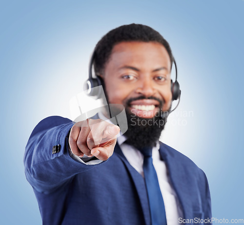 Image of Customer service portrait, happy black man or hand pointing at you, telemarketing choice or insurance agent with promotion decision. Studio face, career job or African person smile on blue background