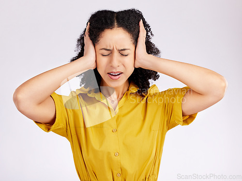 Image of Frustrated woman, headache and anxiety with hands on head in stress against a white studio background. Female person in burnout, fear or ignore with mental health problems, issues or overwhelmed