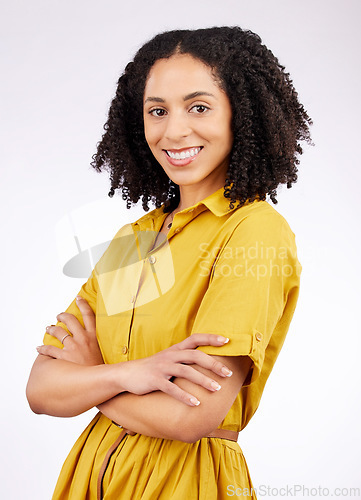 Image of Smile, fashion and portrait of a woman in studio with a positive mindset isolated on a white background. Confident, arms crossed and young African female person with inspiration, style and motivation