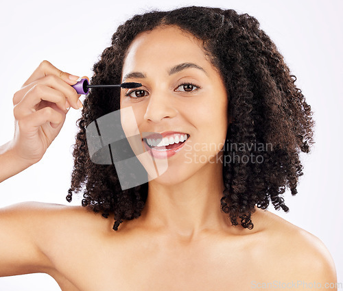 Image of Beauty, mascara and portrait of black woman on a white background for wellness, makeup and cosmetics. Dermatology, cosmetology and face of happy female person with product for eyelashes in studio