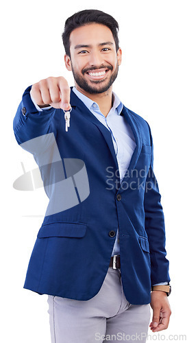 Image of keys, studio portrait and happy man, realtor or person smile for new home investment, property payment or sales. Apartment, house and Asian real estate agent giving ownership on white background