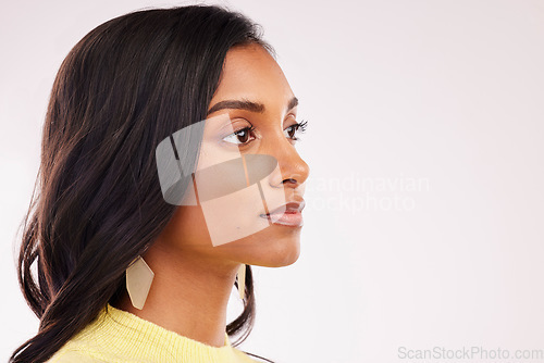 Image of Indian woman, beauty and profile of makeup in studio with space, banner or mockup on white background for cosmetics. Dermatology, face and luxury spa, salon or cosmetic skincare or facial treatment