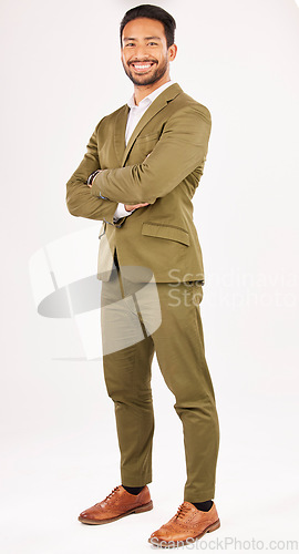 Image of Professional, fashion and portrait of happy man with crossed arms with confident, happiness and pride. Studio, business and male person smile in formal clothes, style and suit on white background