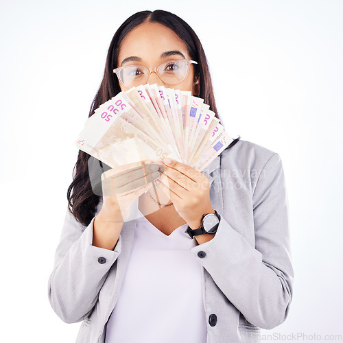 Image of Portrait, money and a woman lottery winner in studio on a white background in celebration of a bonus or promotion. Cash, eyes and finance payment with a young person in glasses holding euro notes
